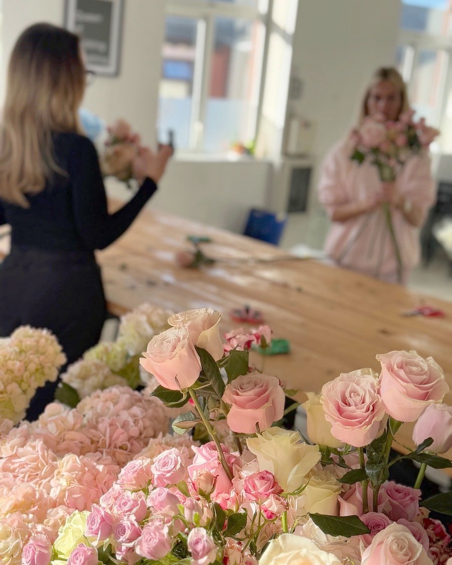 Pink roses and hydrangeas ready to be built into bouquets